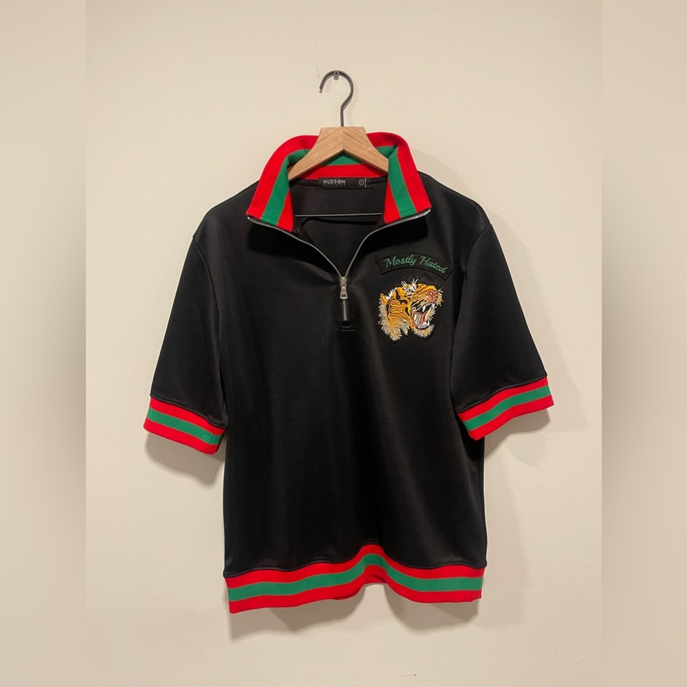 Hudson Outerwear zip up Polo with Red and Green stripes.